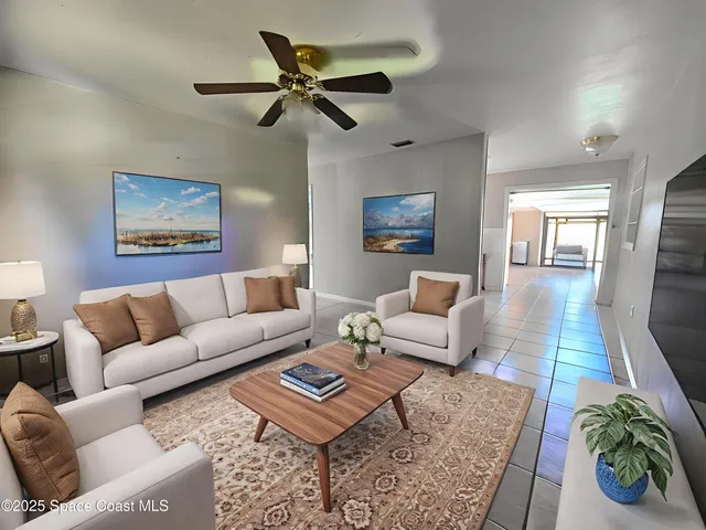 a living room with furniture and a rug