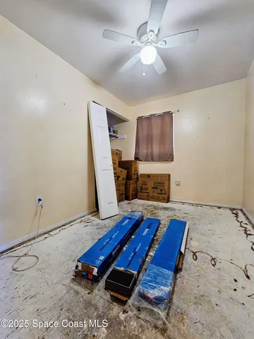 a room with furniture and wooden floor