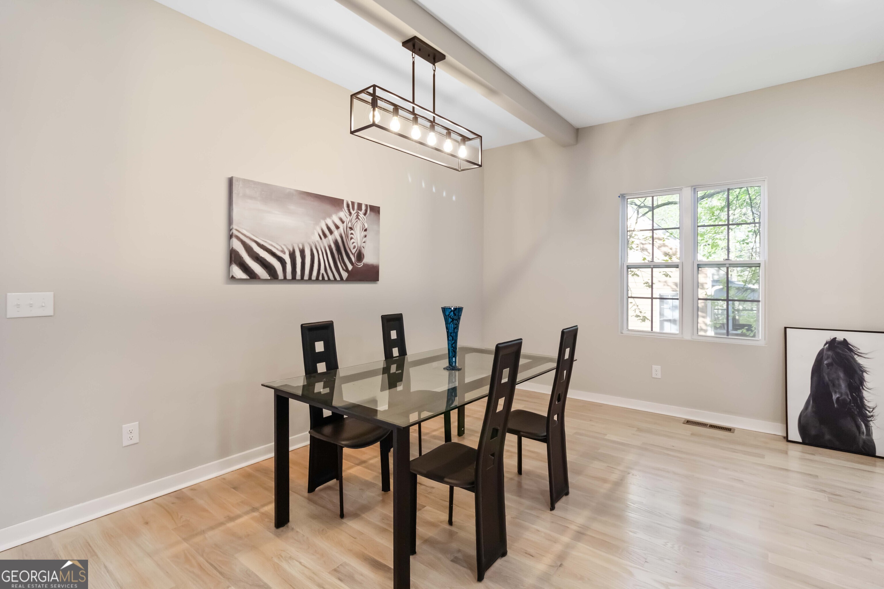 6960 Dockbridge Way Stone Mountain, GA 30087 - Photo 13 of 61 a view of a dining room with furniture
