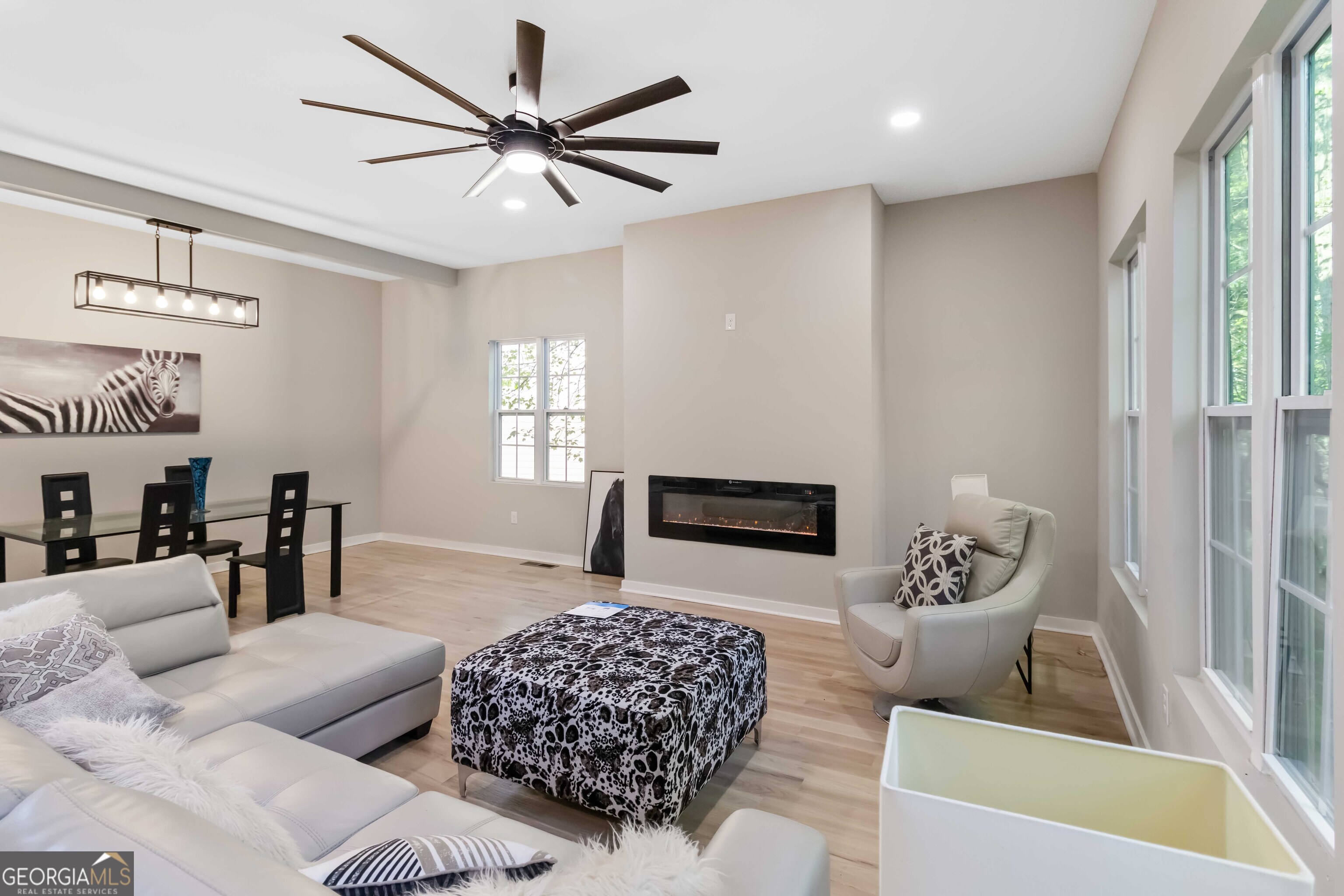 6960 Dockbridge Way Stone Mountain, GA 30087 - Photo 18 of 61 a living room with furniture and a couch