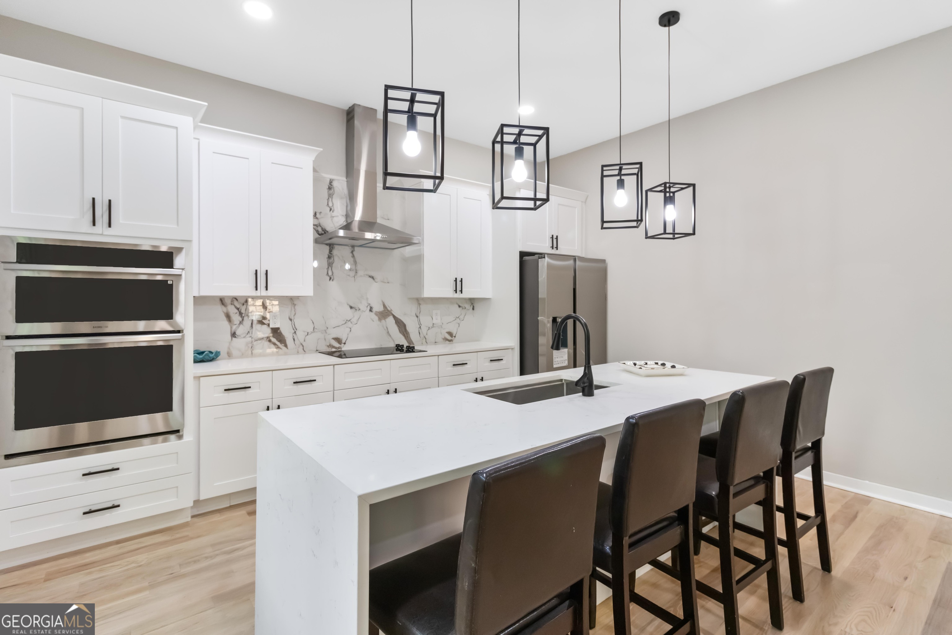 6960 Dockbridge Way Stone Mountain, GA 30087 - Photo 21 of 61 a kitchen with a table and chairs