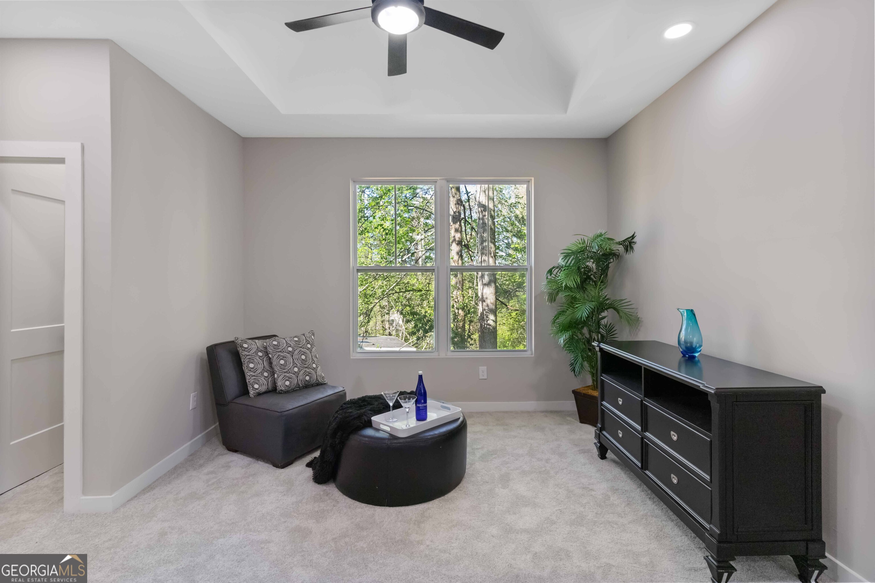 6960 Dockbridge Way Stone Mountain, GA 30087 - Photo 30 of 61 a room with furniture and a window