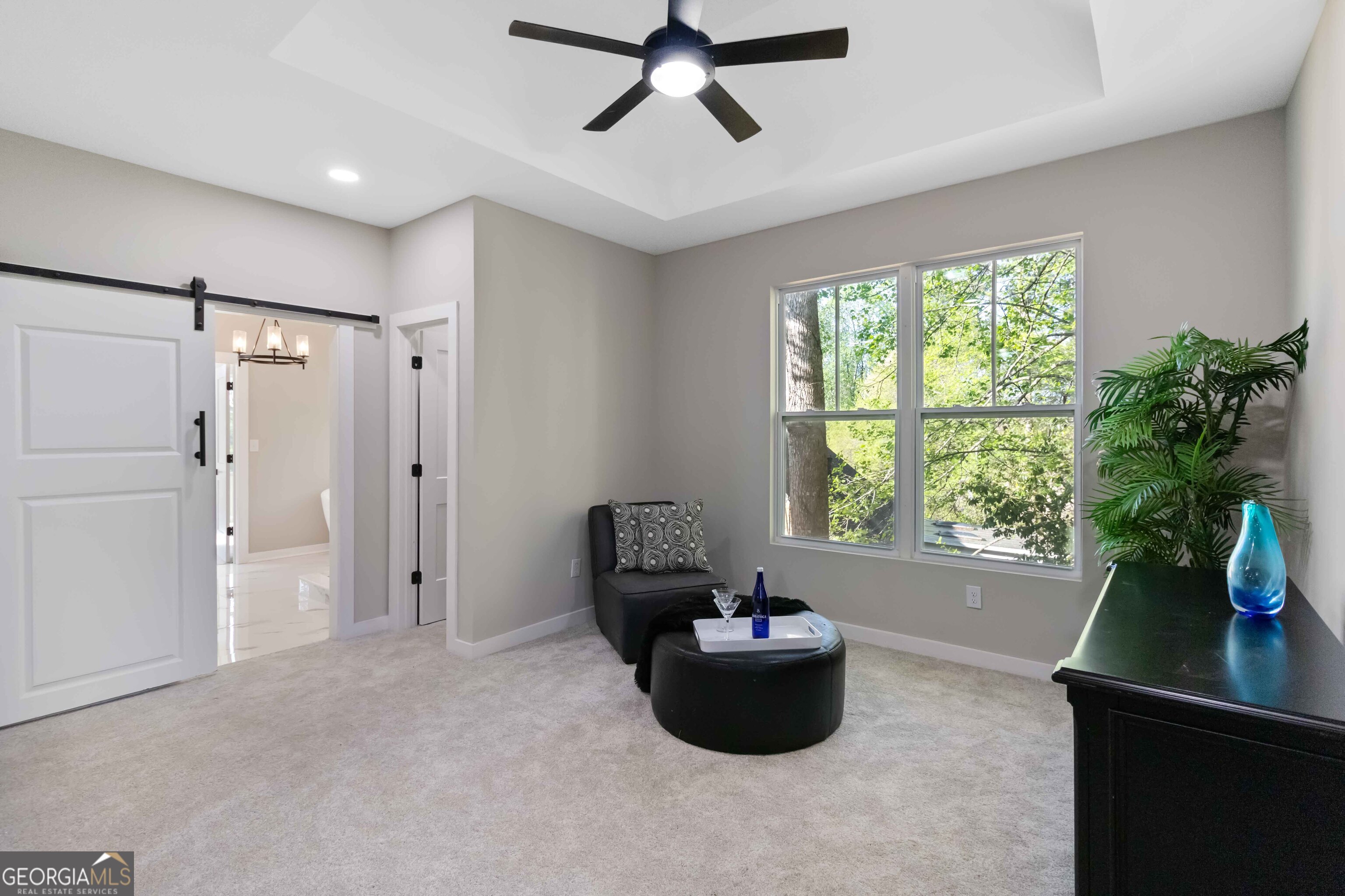 6960 Dockbridge Way Stone Mountain, GA 30087 - Photo 31 of 61 a living room with furniture and a window