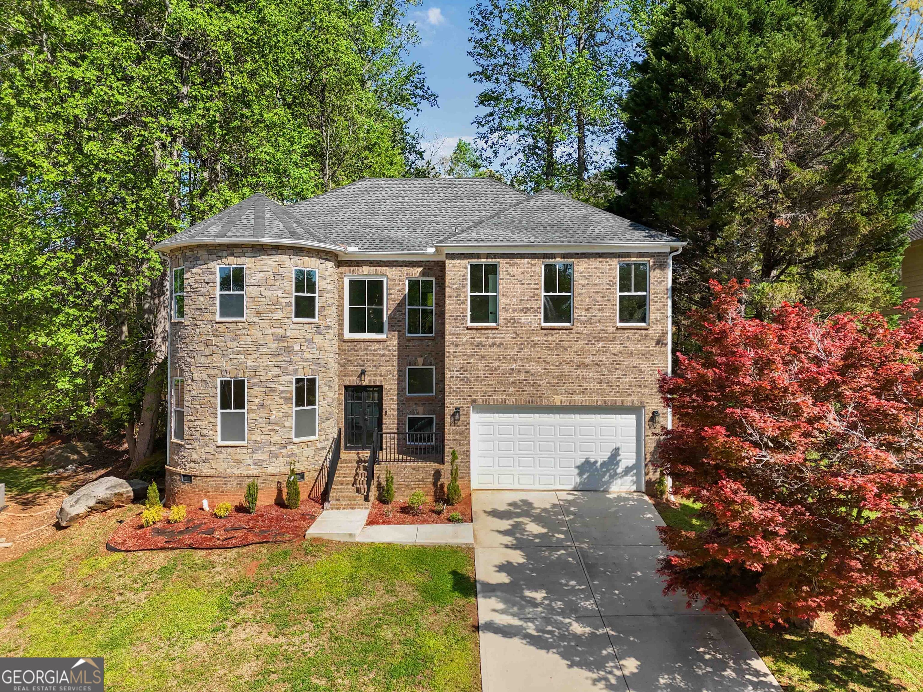 6960 Dockbridge Way Stone Mountain, GA 30087 - Photo 4 of 61 a view of a yard in front of house