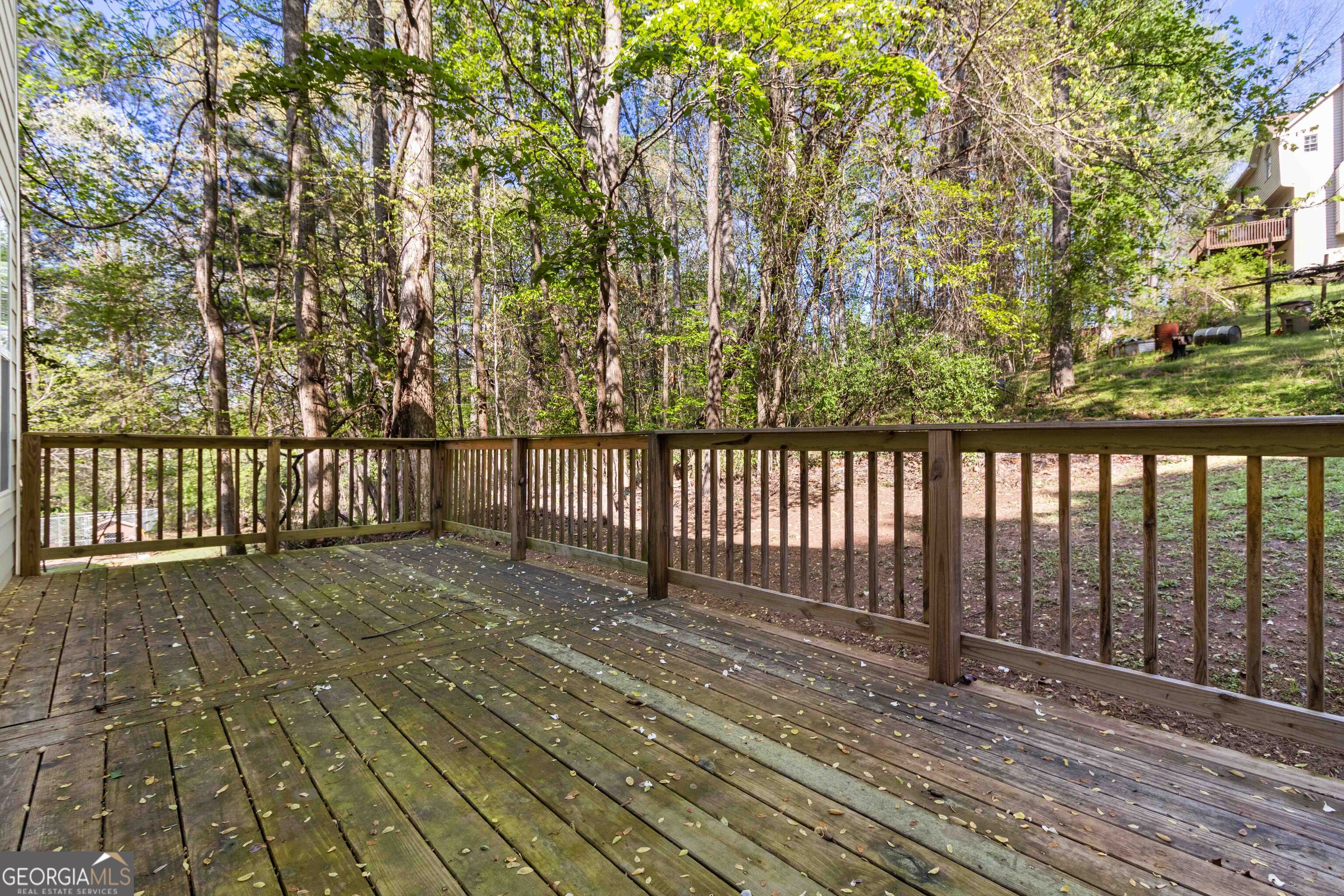 6960 Dockbridge Way Stone Mountain, GA 30087 - Photo 45 of 61 a view of a balcony with wooden floor