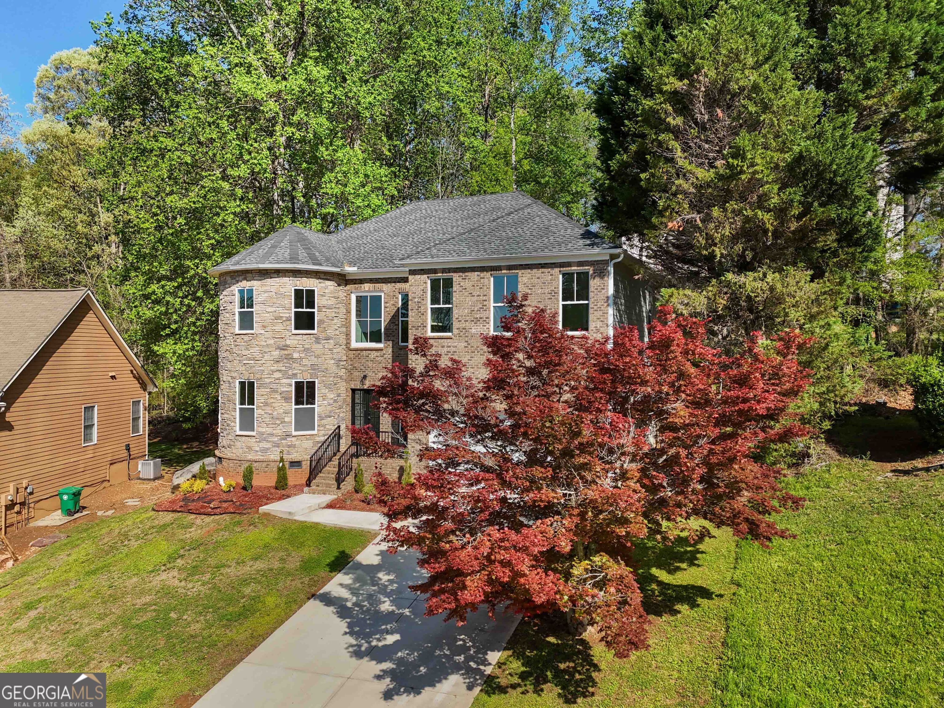 6960 Dockbridge Way Stone Mountain, GA 30087 - Photo 47 of 61 a view of a house with a backyard
