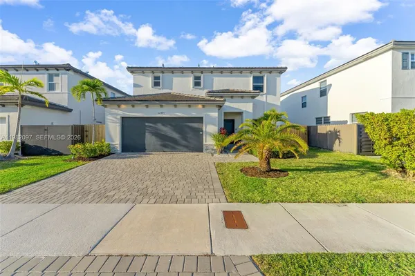 a view of a house with a garden