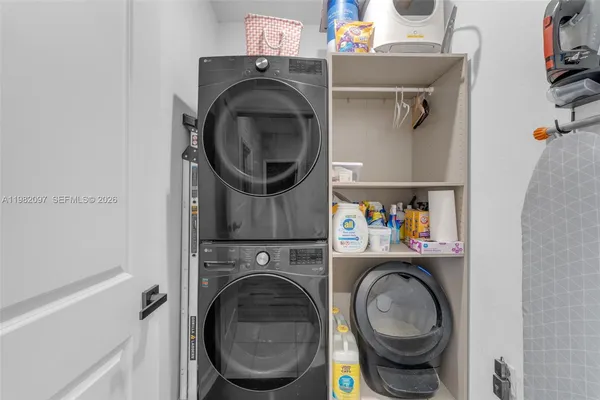 a utility room with dryer and washer