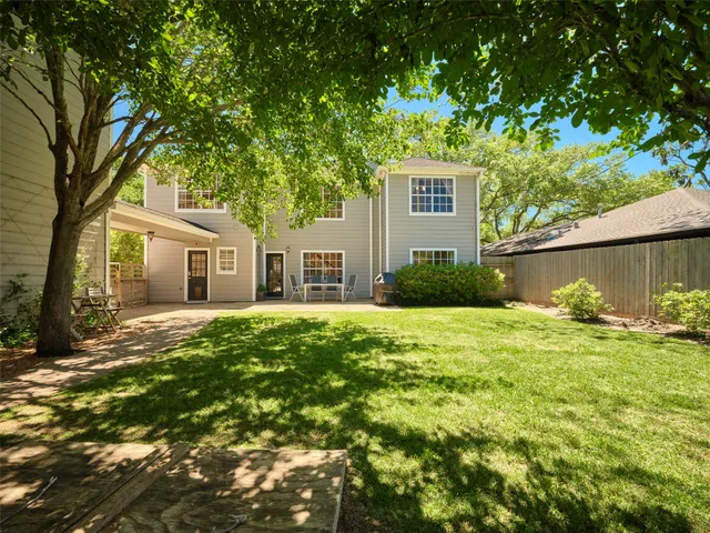 a view of livingroom with hardwood floor and a ceiling fan