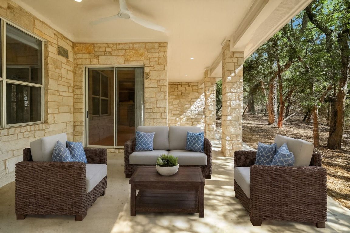 112 Twin Saddles Dripping Springs, TX 78620 - Photo 23 of 29 a balcony with furniture and a potted plant