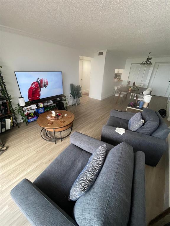 7040 Coral Way Miami, FL 33155 - Photo 3 of 10 a living room with furniture and a couch