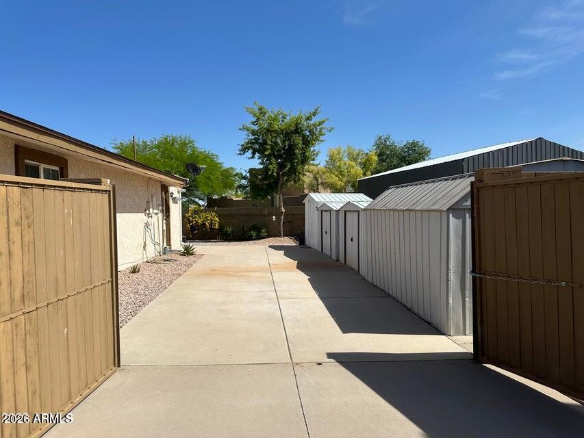 7745 East Mangun Road Mesa, AZ 85207 - Photo 4 of 35 a view of a house with a backyard