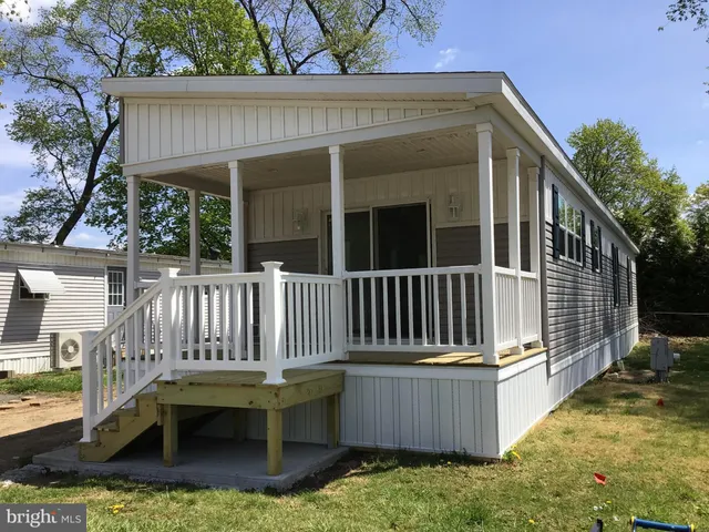 a view of outdoor space with deck and a garden