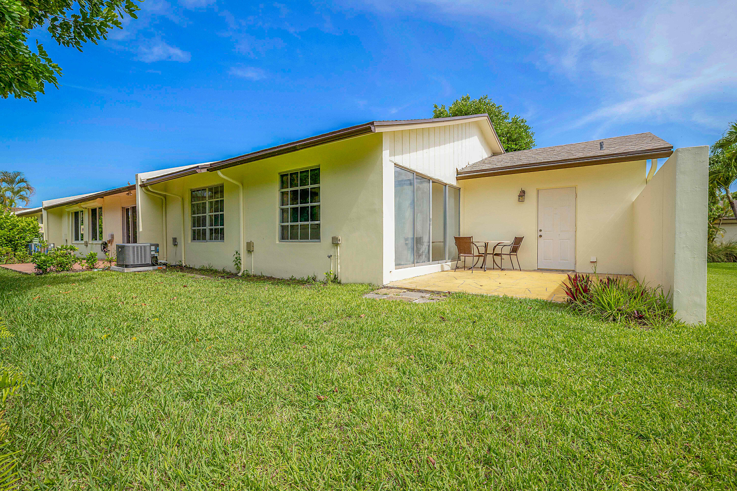 5231 Copperleaf Circle Delray Beach, FL 33484 - Photo 24 of 31 a view of a house with backyard