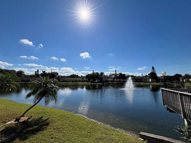 a view of a lake with a outdoor space