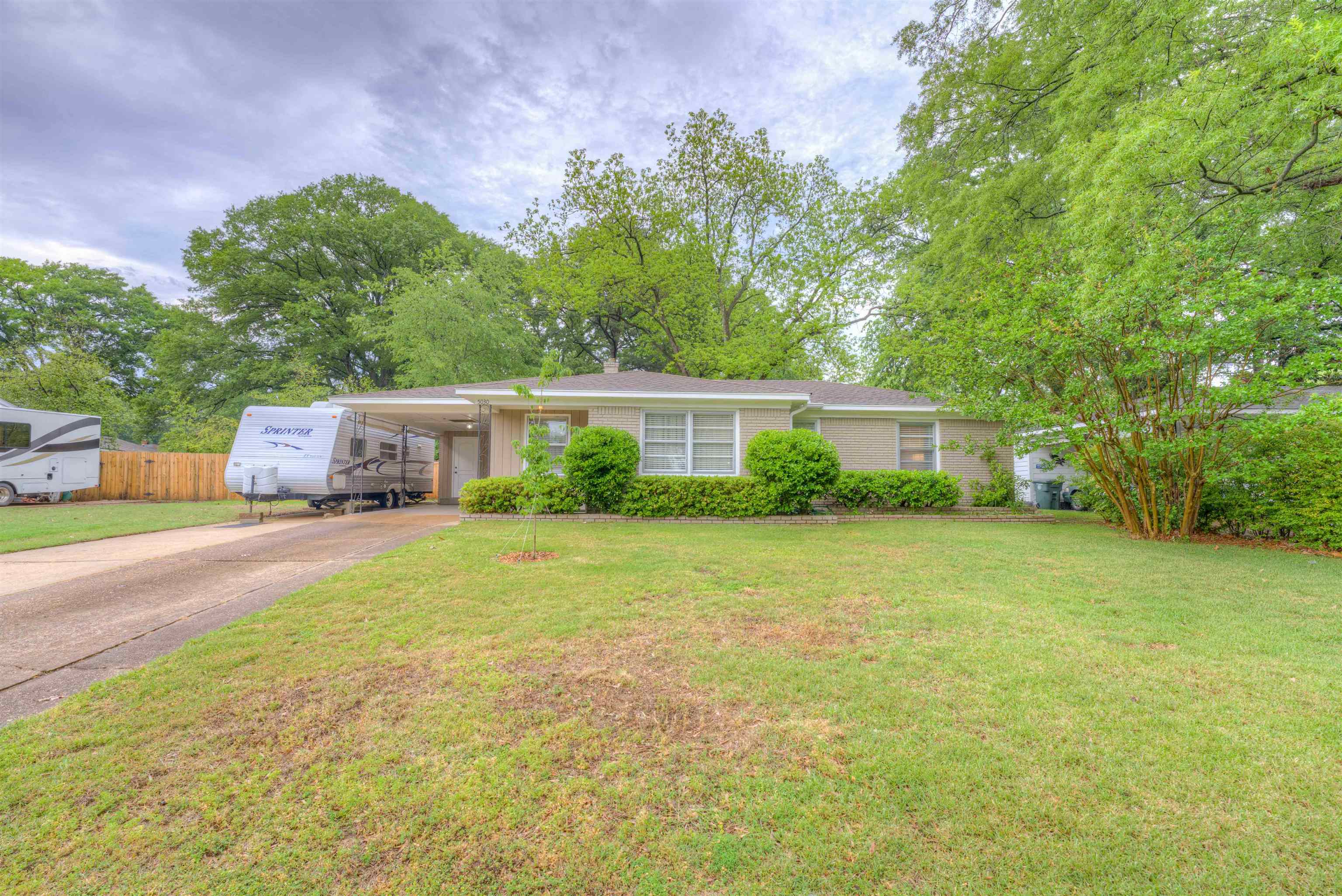 5030 Quince Road Memphis, TN 38117 - Photo 40 of 40 Ranch-style home featuring a front yard