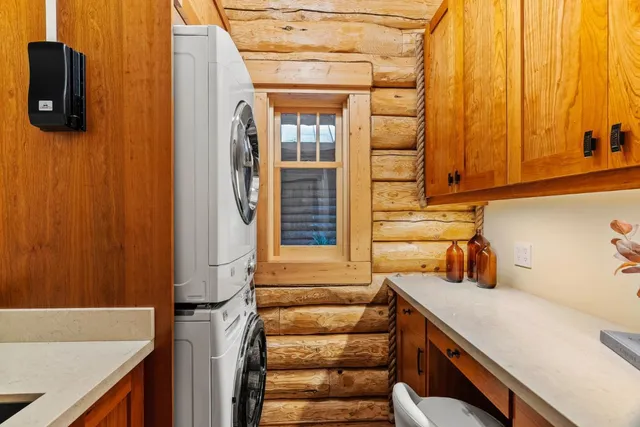 a view of a patio with table and chairs