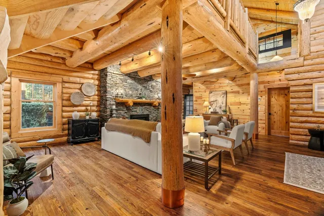 a bedroom with a bed and lamp