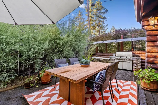 a view of a chairs in wooden deck
