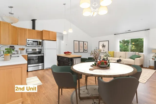 a kitchen with stainless steel appliances granite countertop a sink and dishwasher