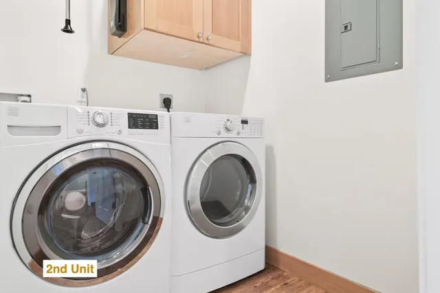 a view of a forest with a houses