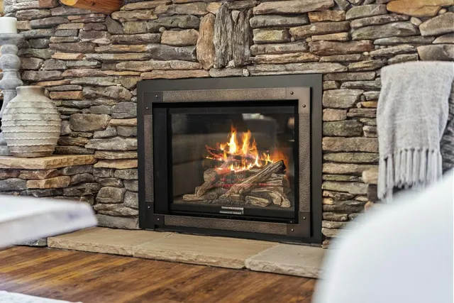 a view of fireplace with wooden floor