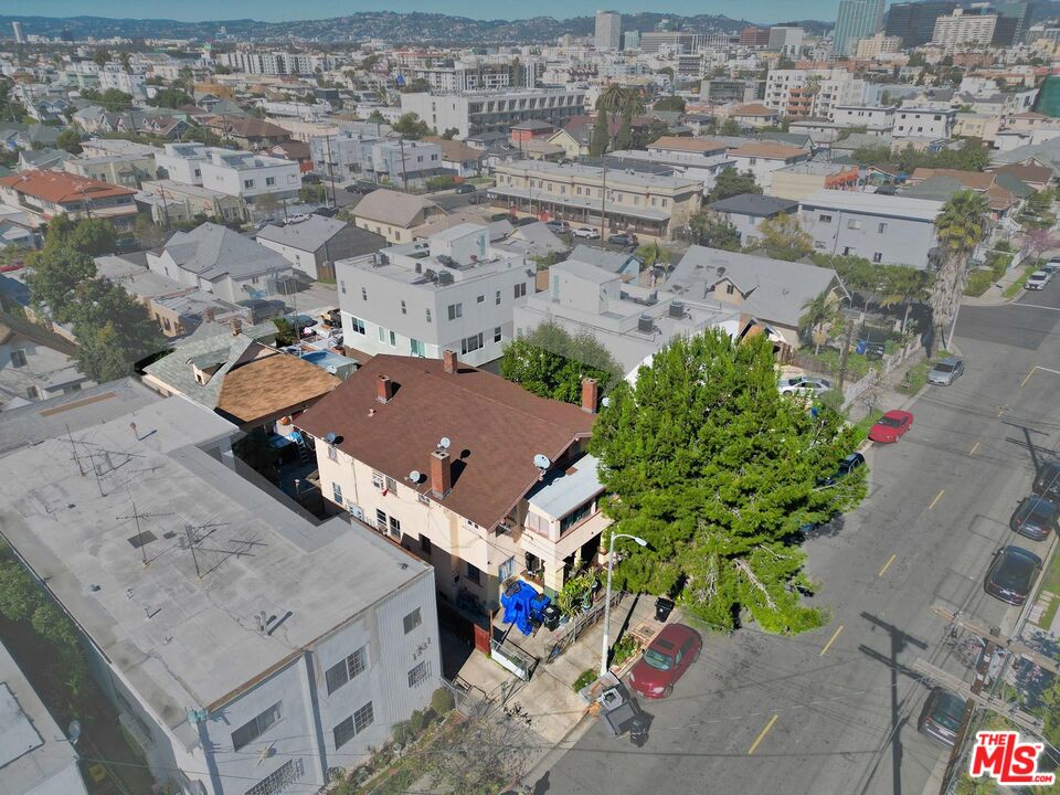 1215 Fedora Street Los Angeles, CA 90006 - Photo 2 of 10 an aerial view of residential houses with outdoor space