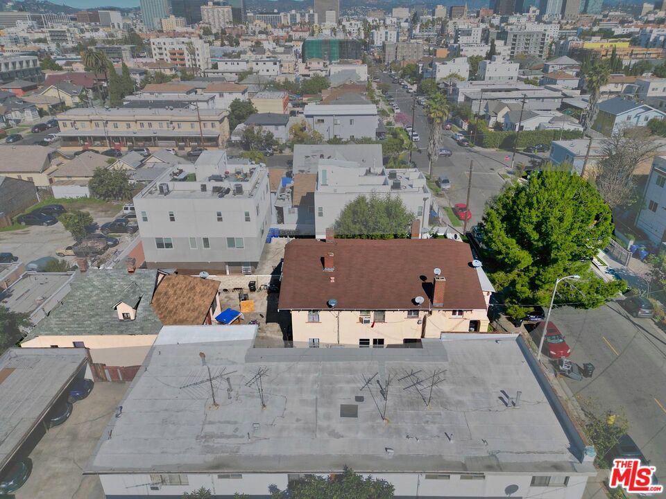 1215 Fedora Street Los Angeles, CA 90006 - Photo 4 of 10 an aerial view of a house with a yard
