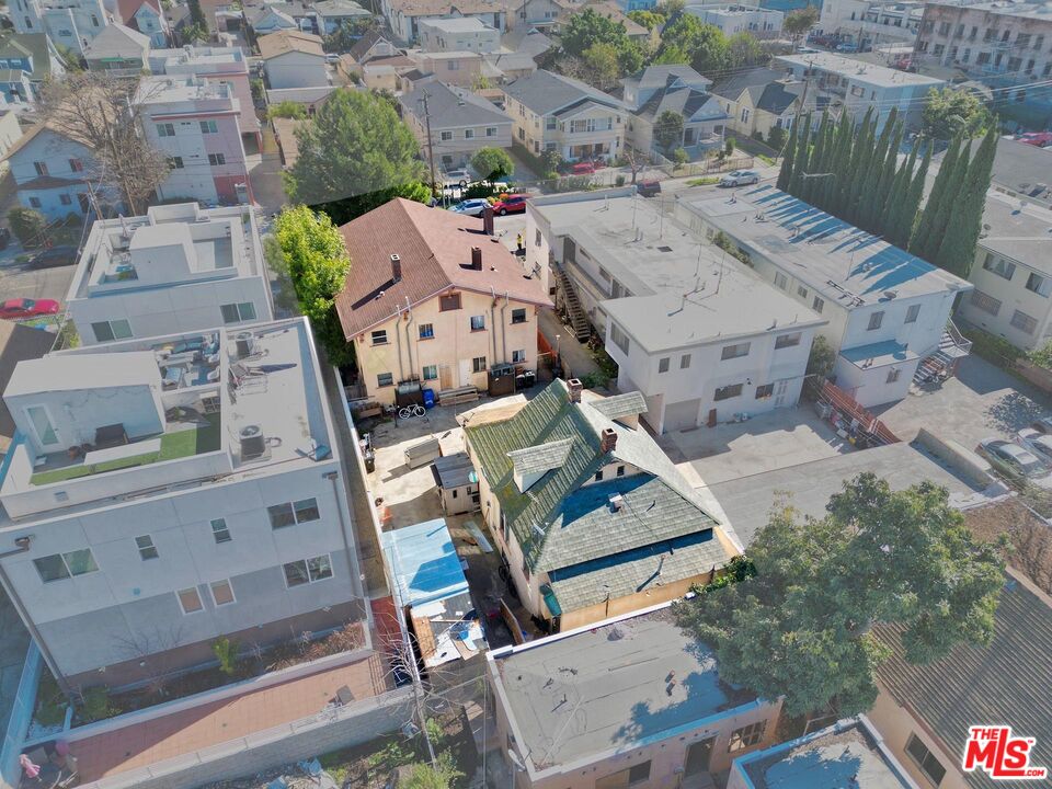 1215 Fedora Street Los Angeles, CA 90006 - Photo 7 of 10 an aerial view of a multi story residential apartment building