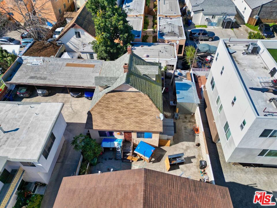1215 Fedora Street Los Angeles, CA 90006 - Photo 9 of 10 an aerial view of multiple houses with yard
