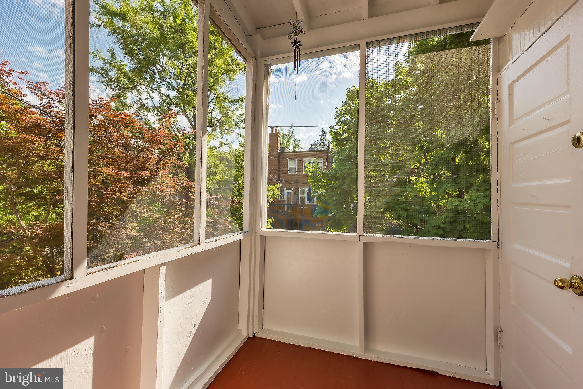 2341 40th Street Northwest, Unit 4 Washington, DC 20007 - Photo 9 of 21 a view of a room with a large window