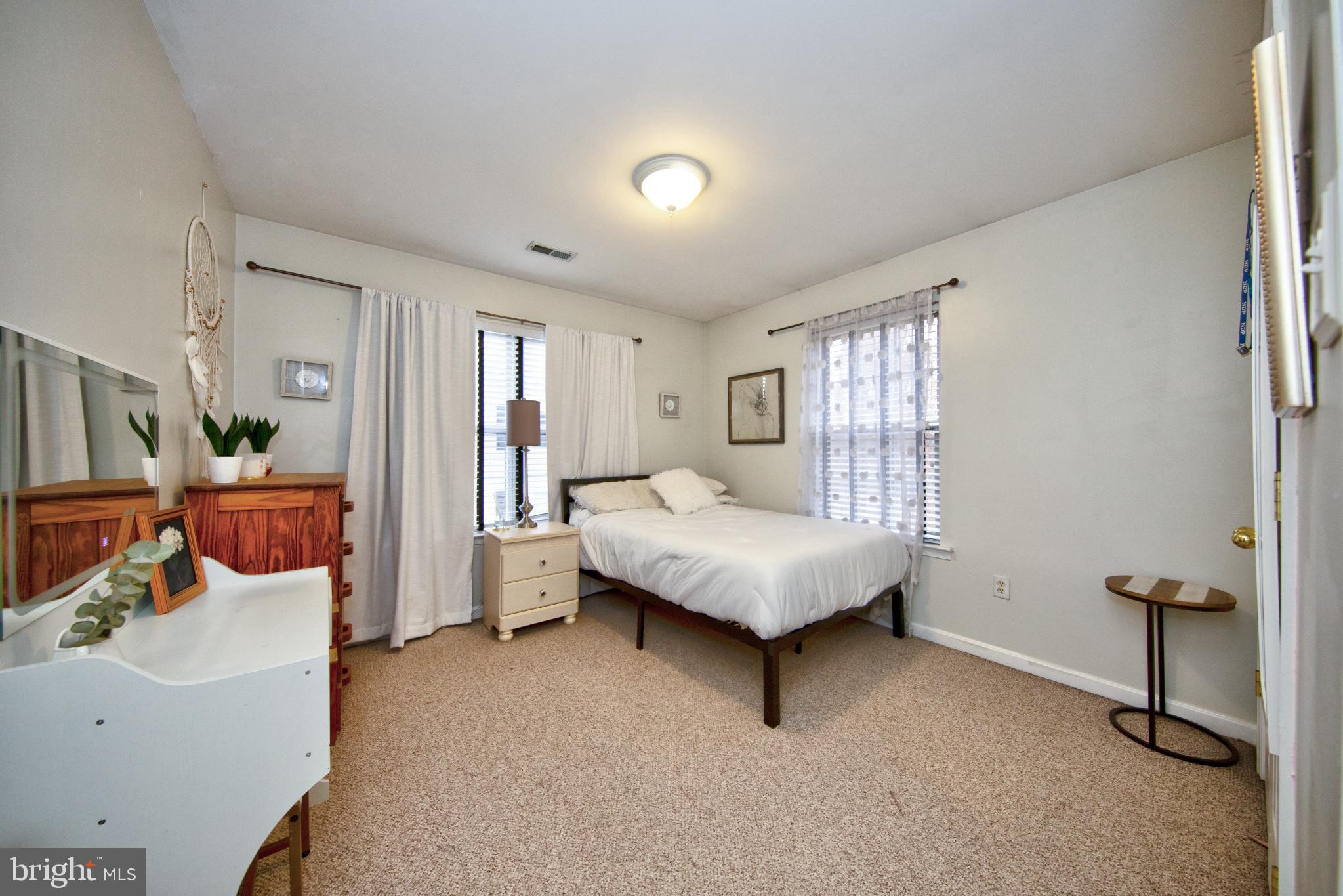 714 Shallow Ridge Court Abingdon, MD 21009 - Photo 23 of 37 Cozy bedroom with natural light.