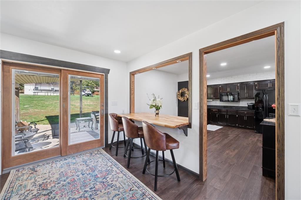 269 Boltz Road Cowansville, PA 16218 - Photo 12 of 38 a view of a dining room with furniture window and wooden floor
