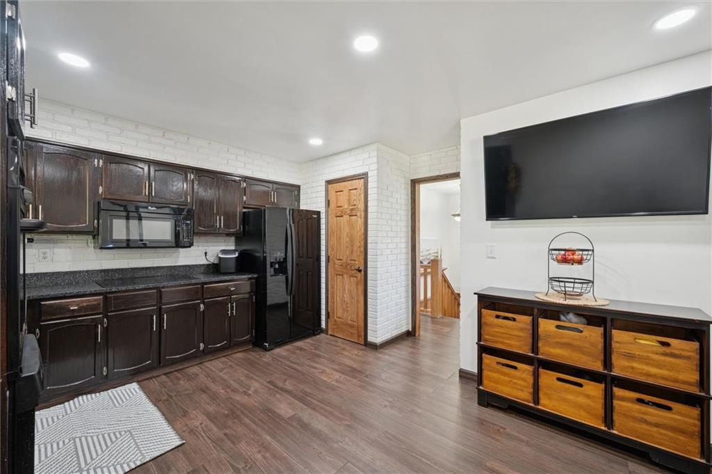 269 Boltz Road Cowansville, PA 16218 - Photo 14 of 38 a kitchen with stainless steel appliances kitchen island granite countertop a refrigerator and a stove top oven