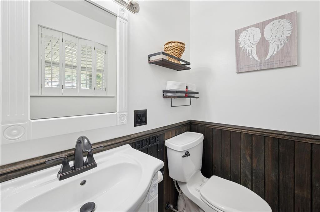 269 Boltz Road Cowansville, PA 16218 - Photo 21 of 38 a bathroom with a sink a toilet and a mirror
