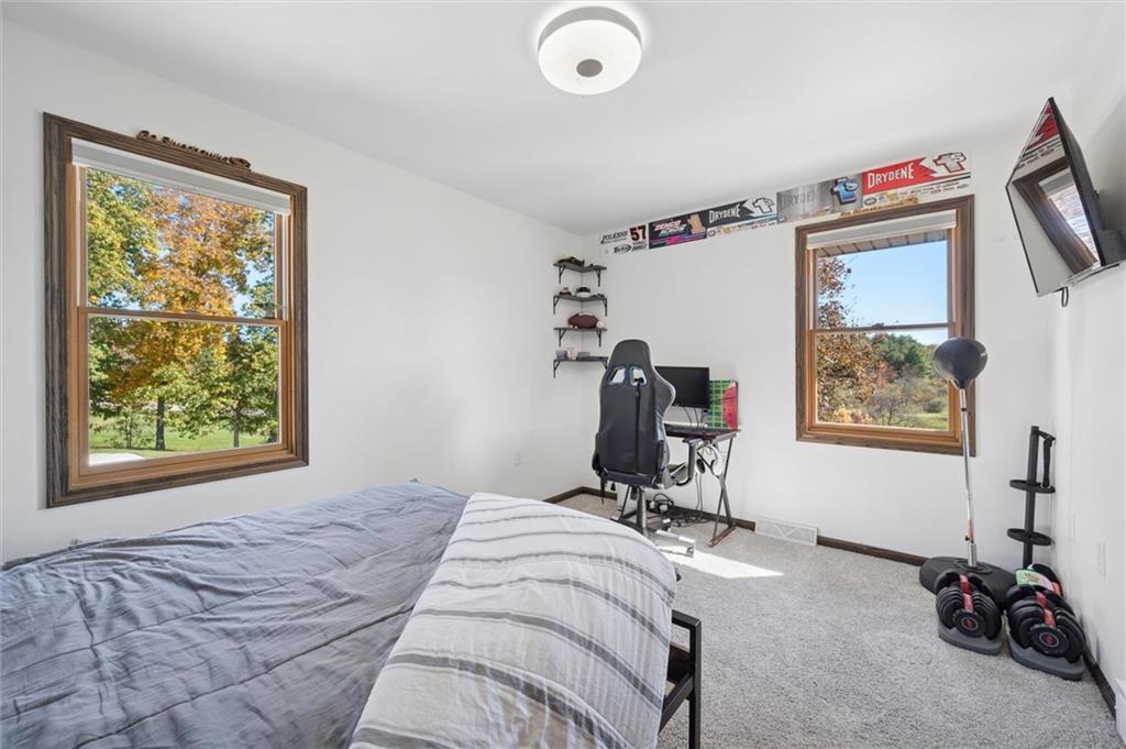 269 Boltz Road Cowansville, PA 16218 - Photo 23 of 38 a bedroom with a bed and a window