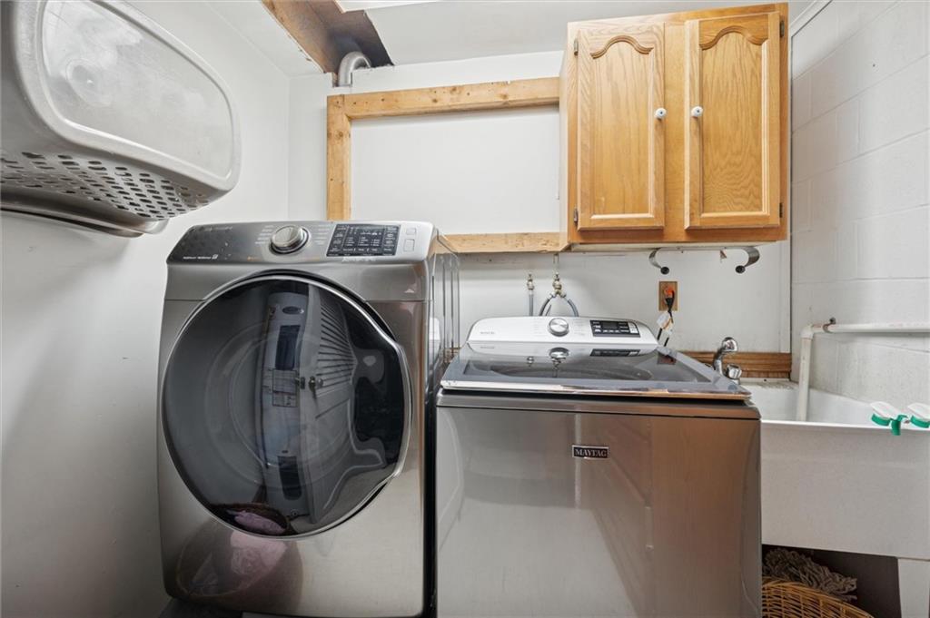 269 Boltz Road Cowansville, PA 16218 - Photo 25 of 38 a utility room with sink dryer and washer