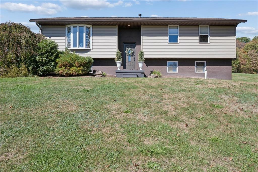 269 Boltz Road Cowansville, PA 16218 - Photo 3 of 38 a front view of a house with garden