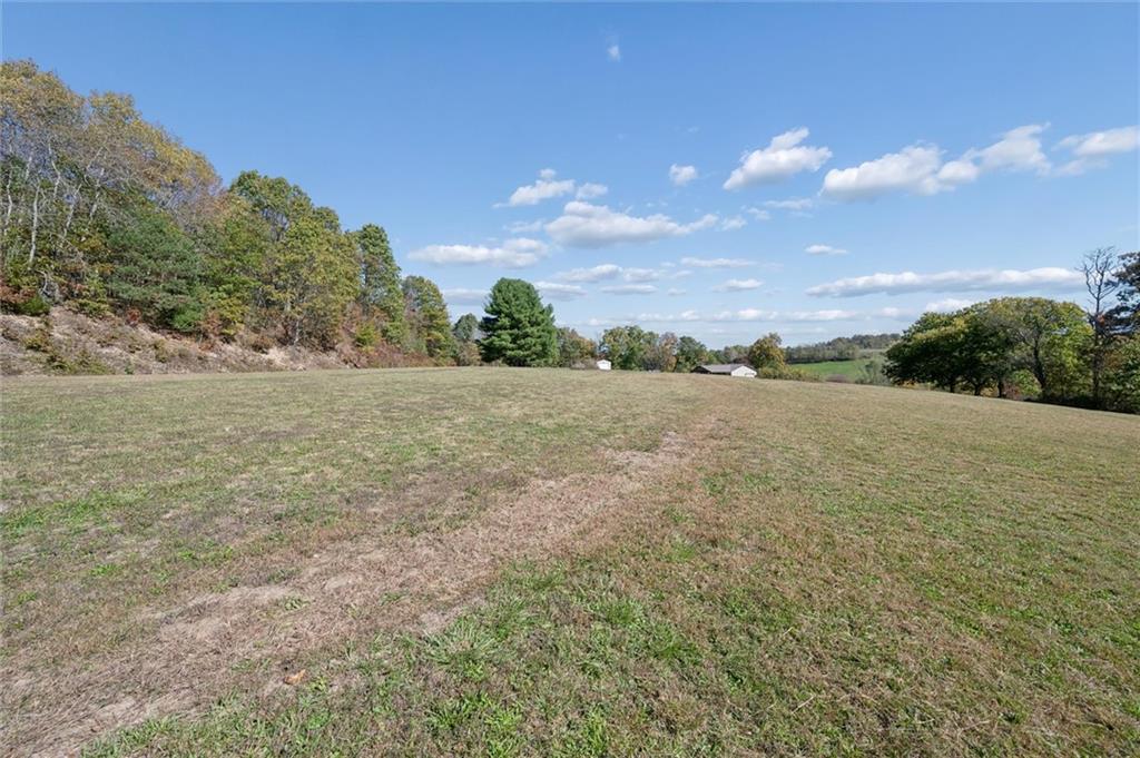 269 Boltz Road Cowansville, PA 16218 - Photo 37 of 38 a view of yard with ocean and mountain in the background