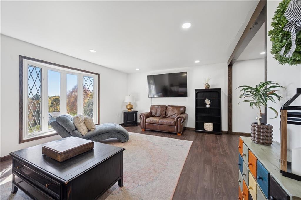 269 Boltz Road Cowansville, PA 16218 - Photo 8 of 38 a living room with furniture and a flat screen tv