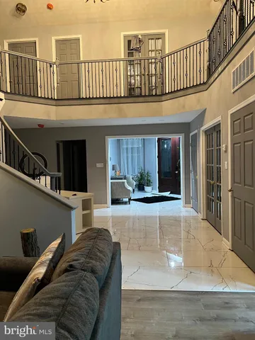 a view of livingroom with furniture and flat screen tv