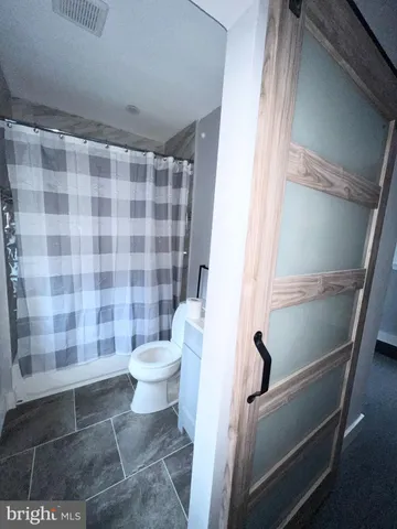 a view of a hallway with workspace