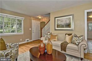 6001 Conway Road Bethesda, MD 20817 - Photo 9 of 21 BRIGHT LVING RM WITH WOOD FLOORS