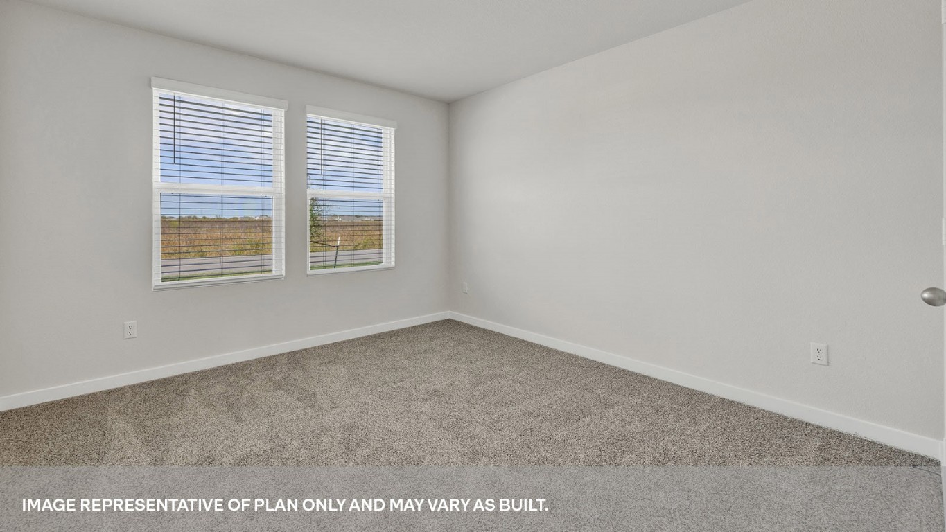 198 Kolbo Crossing Lockhart, TX 78644 - Photo 5 of 23 an empty room with a window
