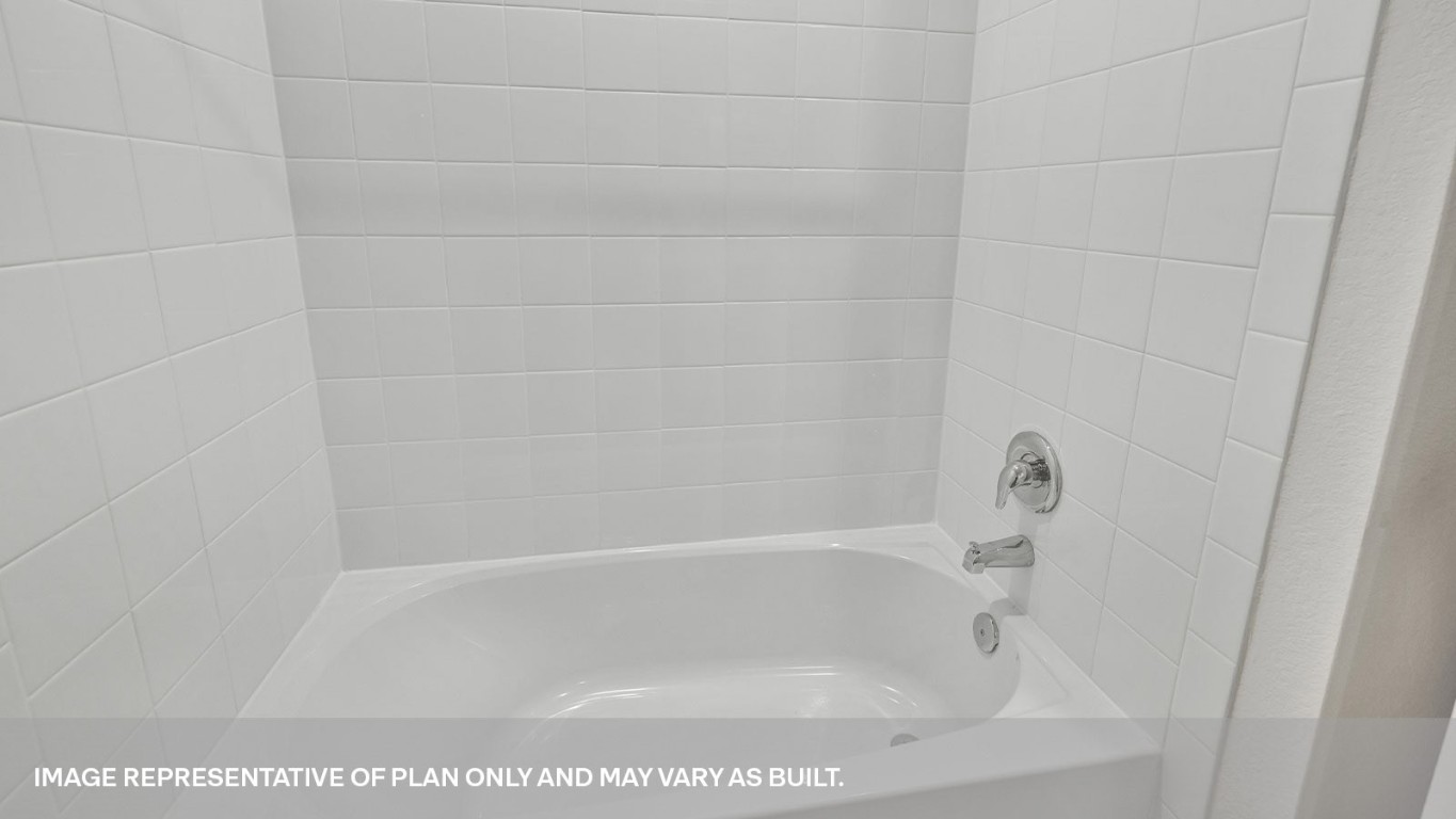 198 Kolbo Crossing Lockhart, TX 78644 - Photo 7 of 23 a close up of a bathtub