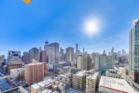 a view of swimming pool from a balcony