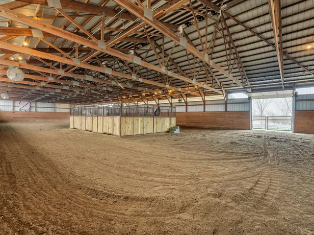 a room with lots of table and mirrors