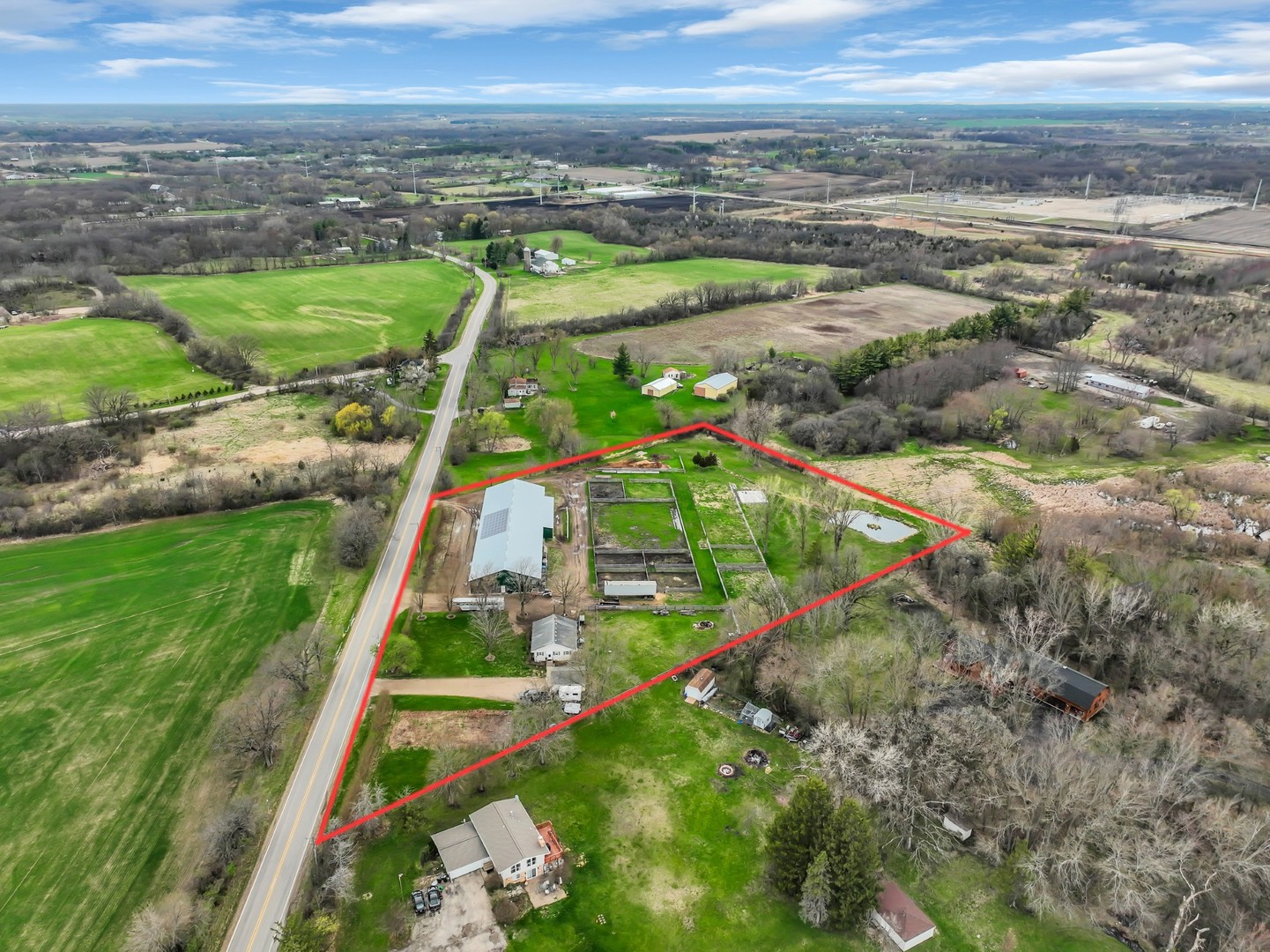 12216 Pleasant Valley Road Woodstock, IL 60098 - Photo 5 of 48 a view of a city