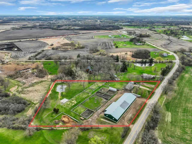 an aerial view of green landscape with outdoor space