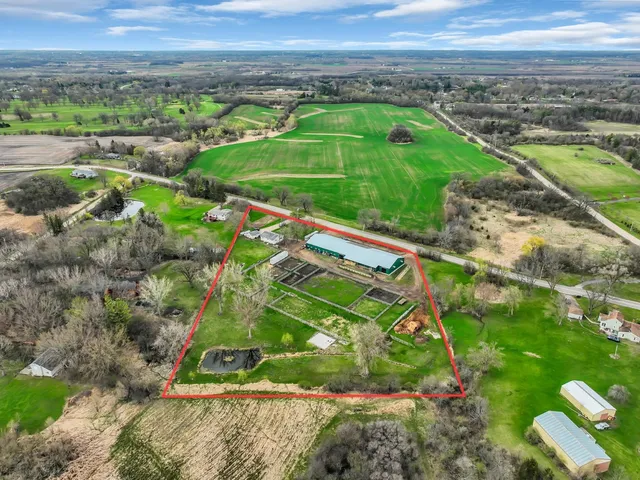 a view of a garden with houses